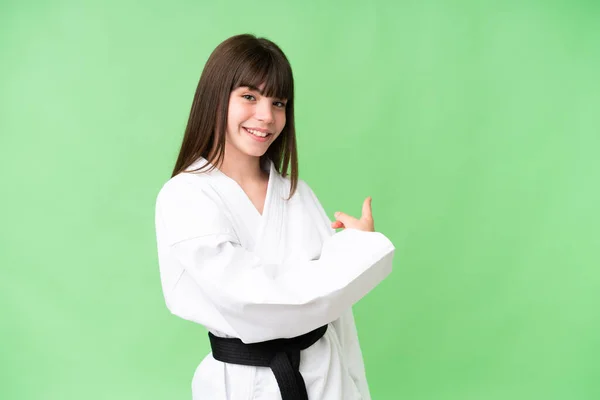 Little Caucasian Girl Doing Karate Isolated Background Pointing Back — Stock Photo, Image