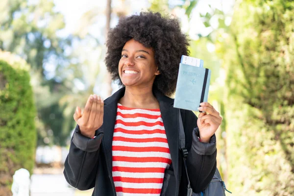 African American Girl Holding Passport Outdoors Inviting Come Hand Happy — Stock Photo, Image