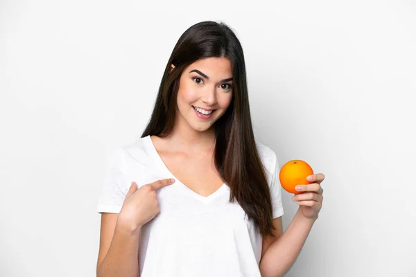 Young Brazilian Woman Holding Orange Isolated White Background Surprise Facial — Stock Photo, Image