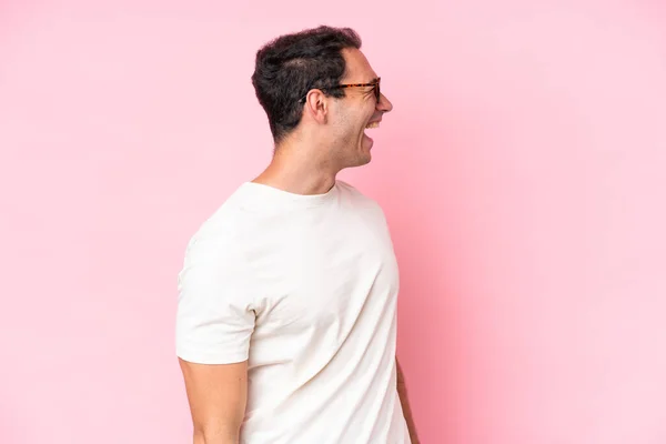 Young Caucasian Man Isolated Pink Background Laughing Lateral Position — Stock Photo, Image