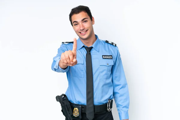 白地に隔離された若い警察の白人男性は指を見せて持ち上げる — ストック写真
