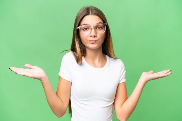 Teenager Caucasian Girl Isolated Background Having Doubts While Raising Hands — Stock Photo, Image