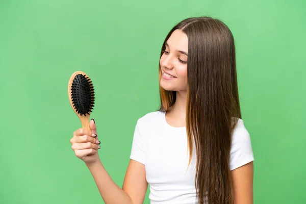 Teenager Caucasian Girl Hair Comb Isolated Background Happy Expression —  Fotos de Stock