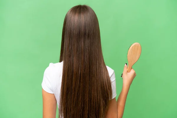 Teenager Kaukasischen Mädchen Mit Haarkamm Über Isolierten Hintergrund Rückenlage — Stockfoto