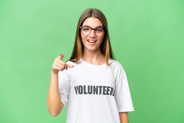 Teenager Volunteer Caucasian Girl Isolated Background Surprised Pointing Front — Stock Photo, Image