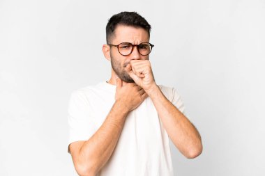 Young handsome caucasian man over isolated white background coughing a lot