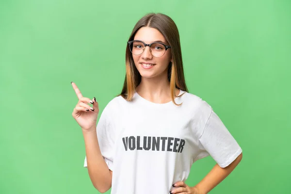 Teenager Volunteer Caucasian Girl Isolated Background Showing Lifting Finger Sign — Stock Photo, Image