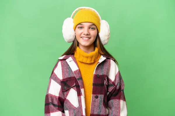 Teenager Caucasian Girl Wearing Winter Muffs Isolated Background Laughing — Stock Photo, Image