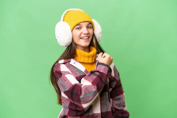 Adolescente Caucásico Chica Usando Invierno Muffs Sobre Aislado Fondo Celebrando —  Fotos de Stock