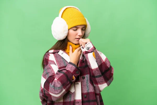Adolescente Caucásico Chica Usando Invierno Muffs Sobre Aislado Fondo Está —  Fotos de Stock