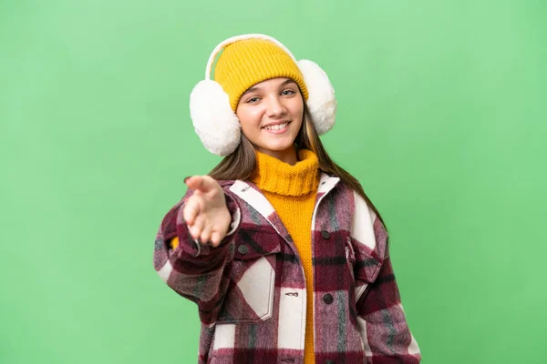 Teenager Caucasian Girl Wearing Winter Muffs Isolated Background Shaking Hands — Stock Photo, Image