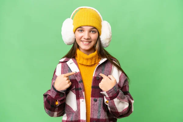 Teenager Caucasian Girl Wearing Winter Muffs Isolated Background Surprise Facial — Stock Photo, Image