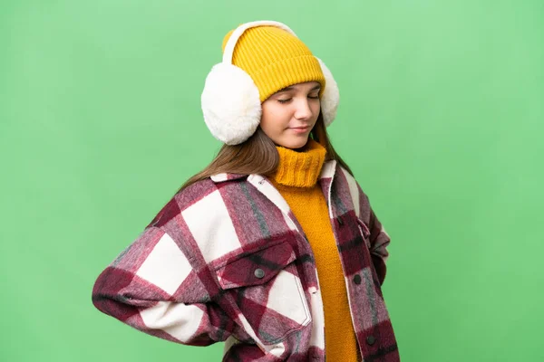 Teenager Caucasian Girl Wearing Winter Muffs Isolated Background Suffering Backache — Stock Photo, Image