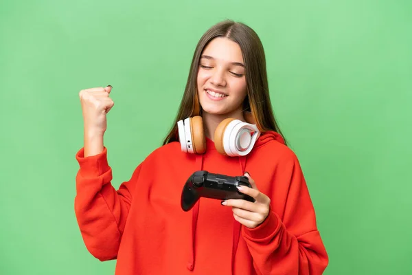 Teenager Caucasian Girl Playing Video Game Controller Isolated Background Celebrating — Stock Photo, Image