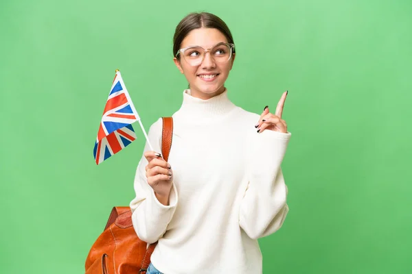 Подростковая Студентка Кавказка Флагом Великобритании Изолированном Фоне Указывает Отличную Идею — стоковое фото