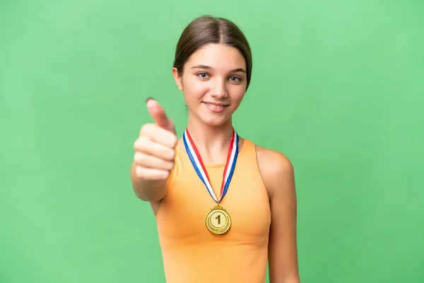 Teenager Běloška Medailemi Izolovaném Pozadí Palci Nahoru Protože Stalo Něco — Stock fotografie