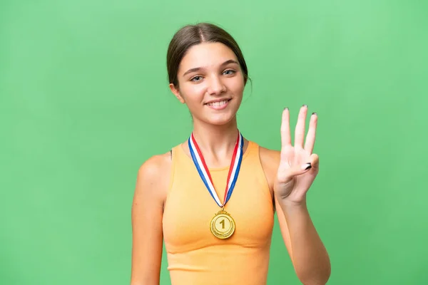 Teenager Běloška Dívka Medailemi Nad Izolované Pozadí Šťastný Počítání Tři — Stock fotografie