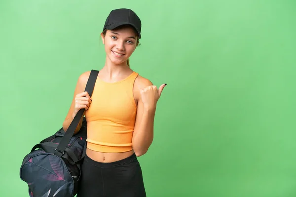 Adolescente Caucasiana Com Saco Desporto Sobre Fundo Isolado Apontando Para — Fotografia de Stock