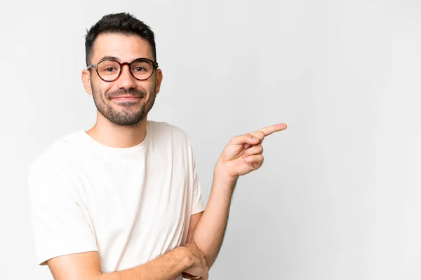Young Handsome Caucasian Man Isolated White Background Pointing Finger Side — Stock fotografie