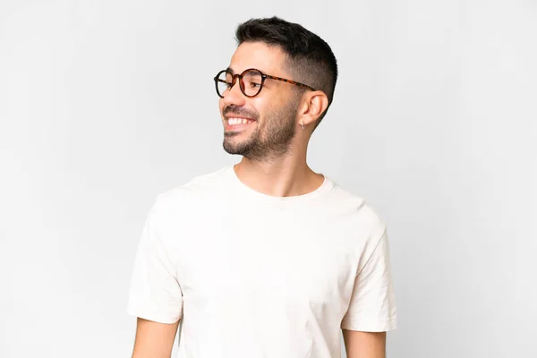 Young Handsome Caucasian Man Isolated White Background Looking Side Smiling — Stockfoto