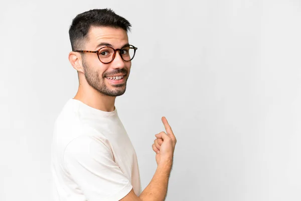 Jonge Knappe Blanke Man Geïsoleerde Witte Achtergrond Wijzend Terug — Stockfoto