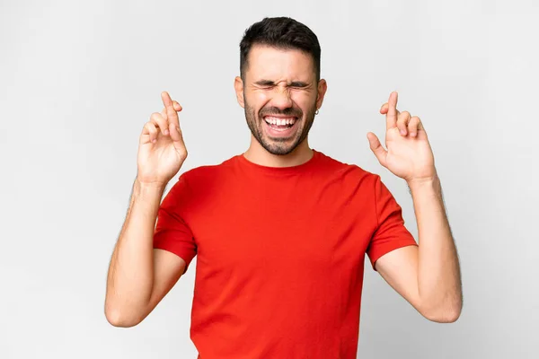 Young Handsome Caucasian Man Isolated White Background Fingers Crossing — 스톡 사진