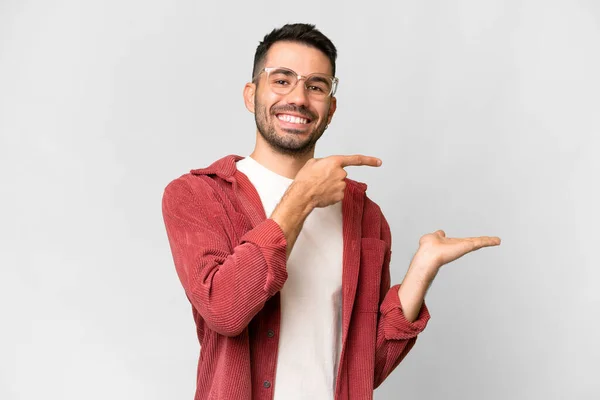 Young Handsome Caucasian Man Isolated White Background Holding Copyspace Imaginary — Stock Photo, Image