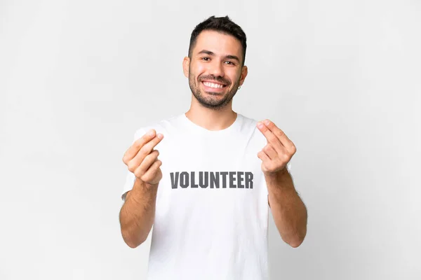 Young Volunteer Caucasian Man Isolated White Background Making Money Gesture — Stock Photo, Image
