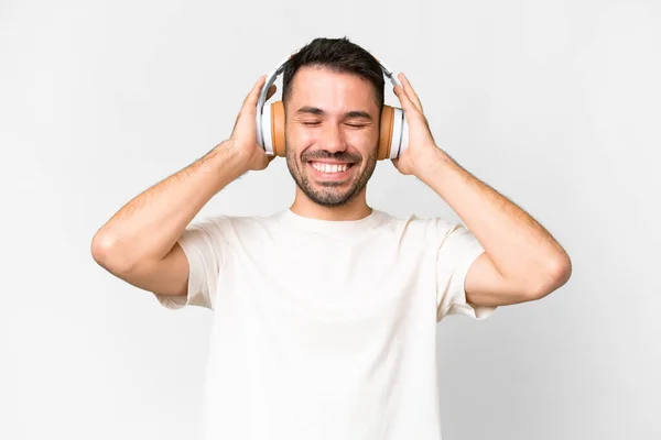 Young Handsome Caucasian Man Isolated White Background Listening Music — Stockfoto