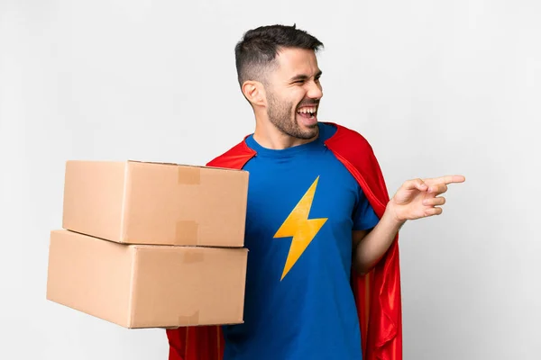 Super Hero Delivery Caucasian Man Isolated White Background Pointing Finger — Stock Photo, Image