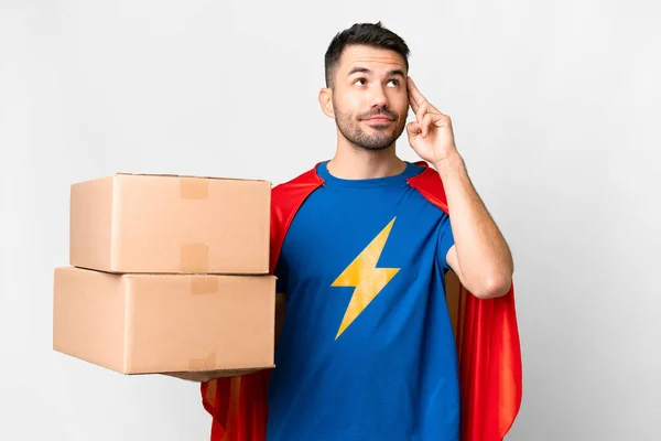 Super Hero Delivery Caucasian Man Isolated White Background Having Doubts — Stock Photo, Image