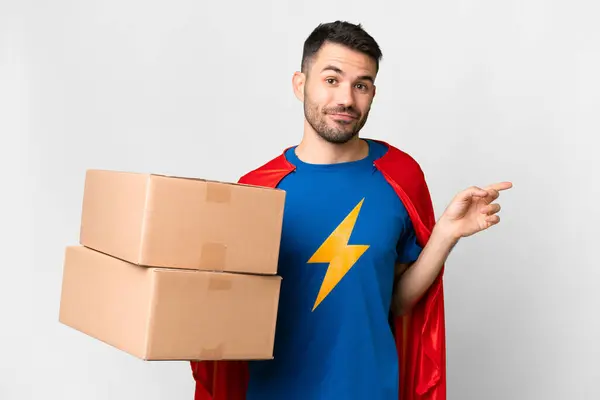 Super Hero Delivery Caucasian Man Isolated White Background Pointing Finger — Stock Photo, Image