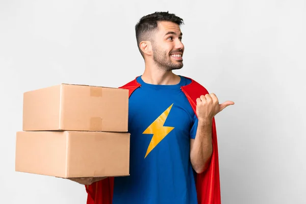 Super Hero Delivery Caucasian Man Isolated White Background Pointing Side — Stock Photo, Image