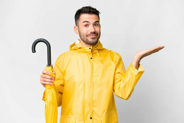 Young Caucasian Man Rainproof Coat Umbrella Isolated White Background Extending — Fotografia de Stock