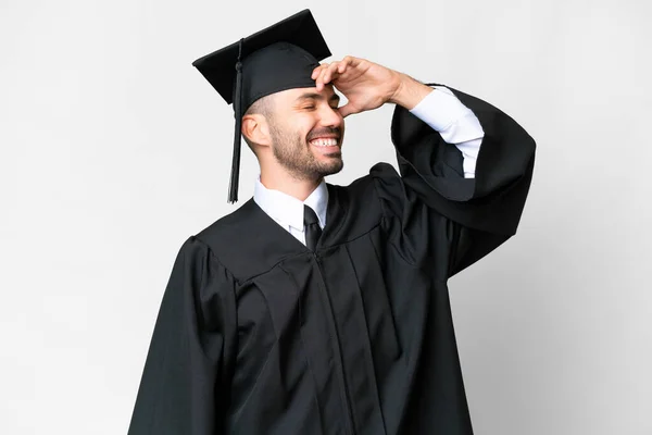 Junger Universitätsabsolvent Mit Isoliertem Weißen Hintergrund Hat Etwas Erkannt Und — Stockfoto