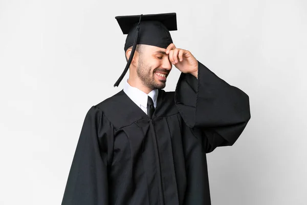 Junger Universitätsabsolvent Lacht Über Isolierten Weißen Hintergrund — Stockfoto