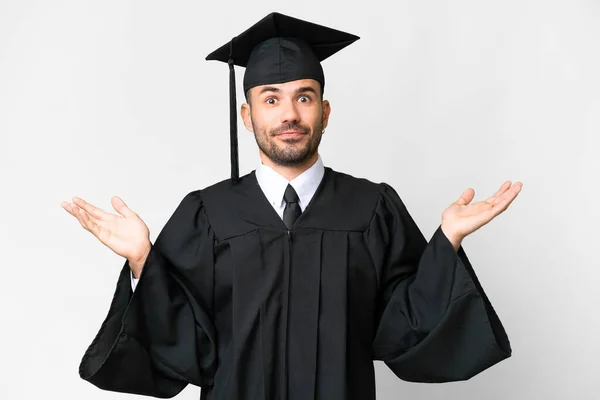 Jovem Universitário Graduado Homem Sobre Isolado Branco Fundo Ter Dúvidas — Fotografia de Stock