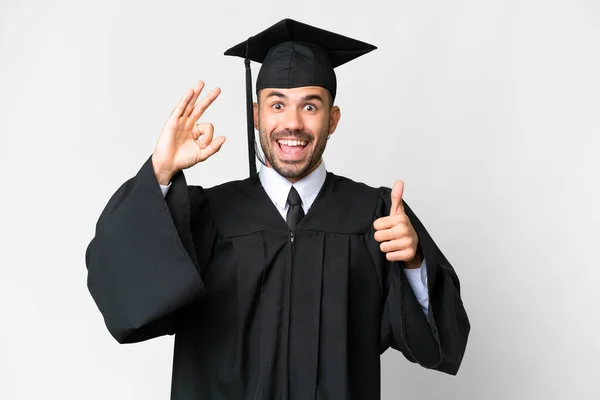 Jovem Universitário Graduado Homem Sobre Isolado Branco Fundo Mostrando Sinal — Fotografia de Stock