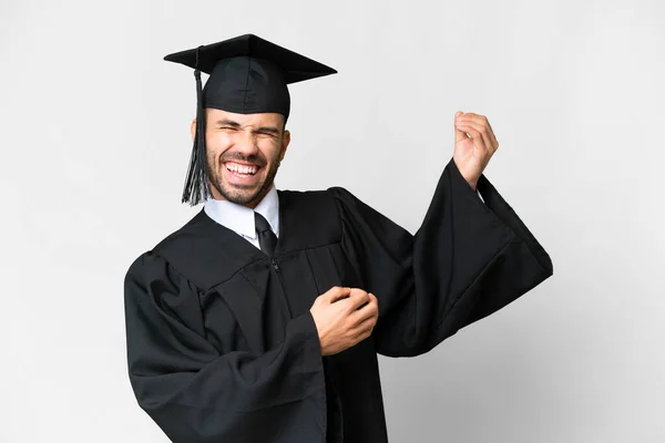 Νεαρός Απόφοιτος Πανεπιστημίου Άνθρωπος Πάνω Από Απομονωμένο Λευκό Φόντο Κάνοντας — Φωτογραφία Αρχείου