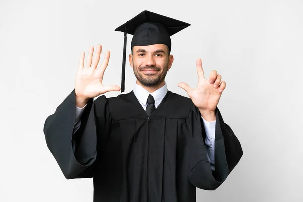 Молодий Випускник Університету Над Ізольованим Білим Тлом Підраховує Сім Пальцями — стокове фото