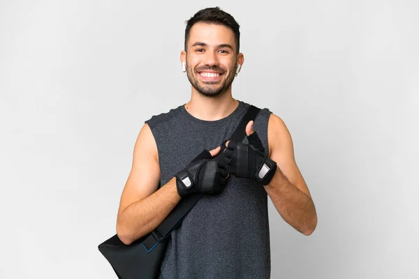 Young Sport Caucasian Man Sport Bag Isolated White Background Giving —  Fotos de Stock