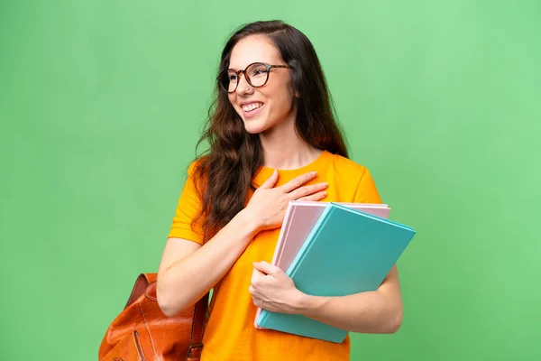 Junge Kaukasische Studentin Mit Isoliertem Hintergrund Blickt Lächelnd Auf — Stockfoto