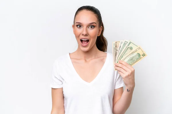 Young Caucasian Woman Taking Lot Money Isolated White Background Surprise — Foto de Stock