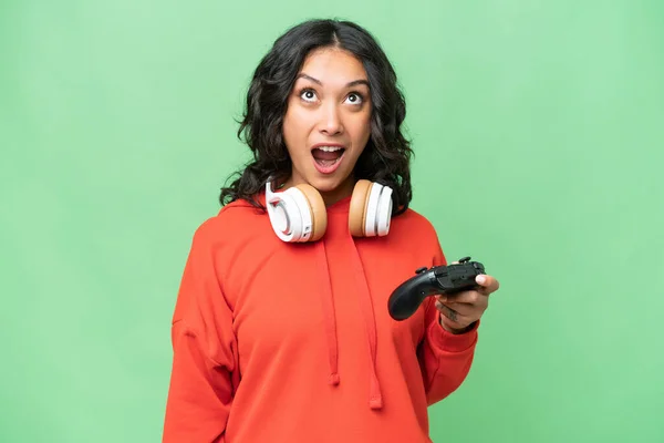 Young Argentinian Woman Playing Video Game Controller Isolated Background Looking — Stock Photo, Image