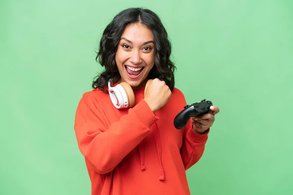 Young Argentinian Woman Playing Video Game Controller Isolated Background Celebrating — Stock Photo, Image