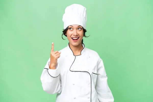 Giovane Chef Donna Argentina Sfondo Isolato Puntando Sorpreso — Foto Stock