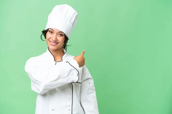Giovane Chef Donna Argentina Sfondo Isolato Che Punta Indietro — Foto Stock