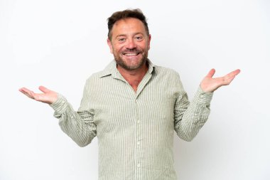 Middle age caucasian man isolated on white background with shocked facial expression
