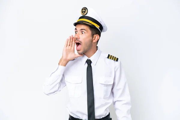 Airplane Pilot Isolated White Background Shouting Mouth Wide Open Lateral —  Fotos de Stock