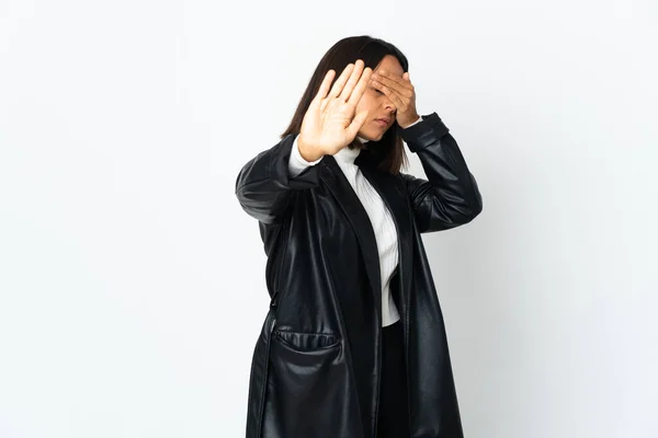 stock image Young latin woman isolated on white background making stop gesture and covering face